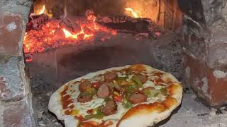 sausage and peppers pizza in a homemade outdoor wood fired oven [upl. by Quintus]