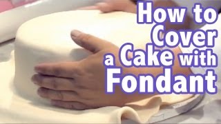 How to cover a cake with Rolled Fondant FondX  Cake Tutorials [upl. by Gnouhk]