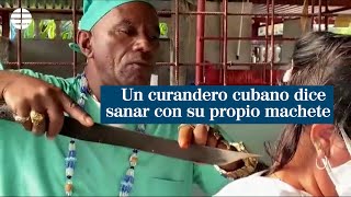 Un curandero cubano dice sanar cualquier tipo de dolencia con su machete [upl. by Aniryt128]