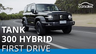 Is this hybrid Chinese offroader a worthy Jeep Wrangler rival  2023 GWM Tank 300 Hybrid Review [upl. by Alyakcm]