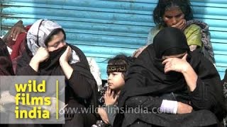 Shia women cry as the Muharram procession passes through [upl. by Bale]