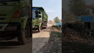 A loaded Hino truck traverses a bad road automobile construction jcb truckhino [upl. by Agn]