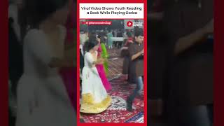 Navratri 2024 Viral Video Shows Youth Reading a Book While Playing Garba [upl. by Jea]