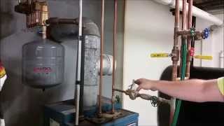 How To Remove Air From Your Heating System [upl. by Lori]