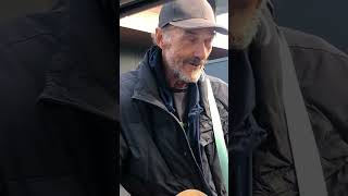 John The Homeless man with talent plays Sultans of Swing [upl. by Fante]