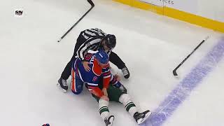 Kirill Kaprizov heads to the locker room after a collision with Drake Caggiula [upl. by Nallek]