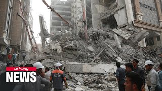 Five dead 80 trapped after building collapse in Iran [upl. by Joellyn]