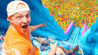 BIGGEST Backyard Water Slide With 100 MILLION ORBEEZ [upl. by Zuckerman]