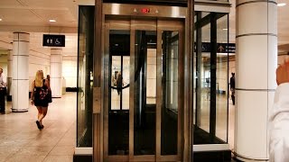 Epic Priceless amp Amazing inground hydraulic glass elevators  Montreal Trudeau Airport YUL [upl. by Cardon822]