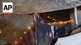 Displaced Palestinians in Gaza decorate their tents for Ramadan [upl. by Huppert]