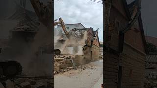 Excavator dismantles tile house for reconstruction [upl. by Rhiana307]