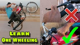 One Wheeling Best Tip  How To Wheelie Honda 125 [upl. by Oitaroh]